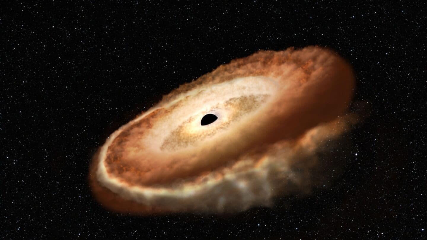 Astronomers identify cause of delayed supermassive black hole 'burps'