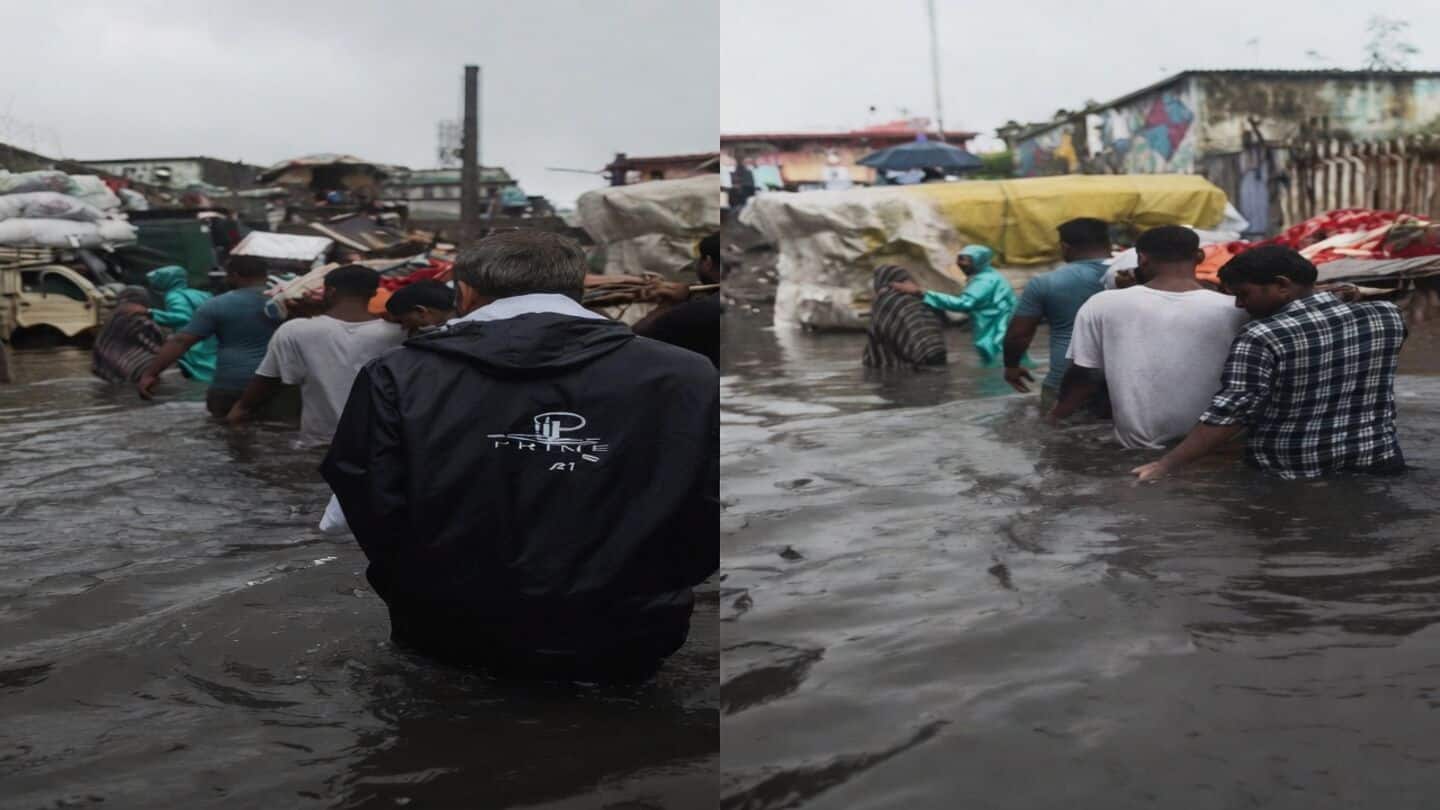 Family in Surat wades knee deep floodwater to cremation ground