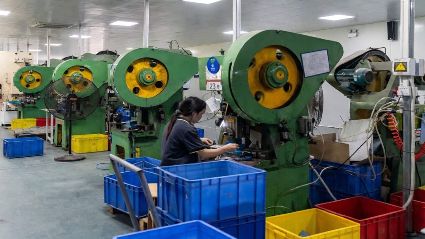China's factory output rises 5.2% while retail sales grow 0.4%
