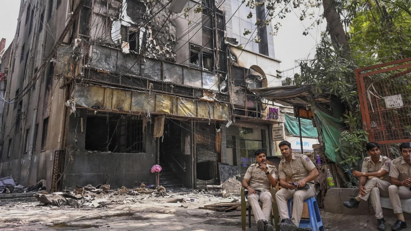 Delhi fire leaves families waiting to claim bodies and belongings