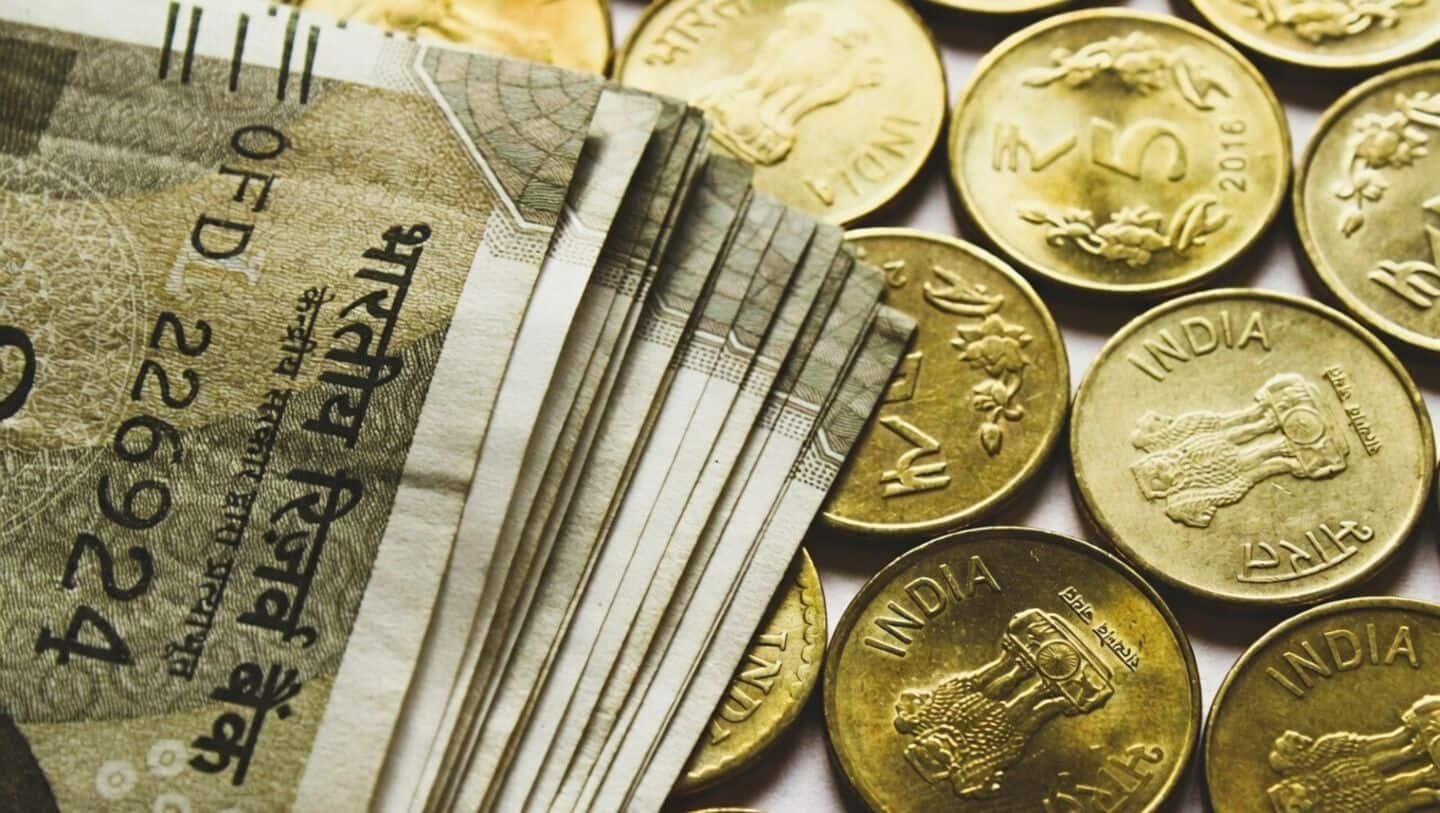 Rupee opens at 93.00 per US dollar, up 10 paise