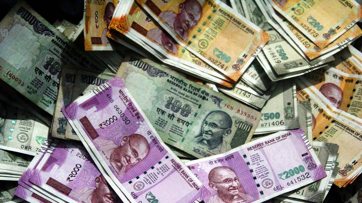 Indian rupee closes at record low of 87.59 against dollar