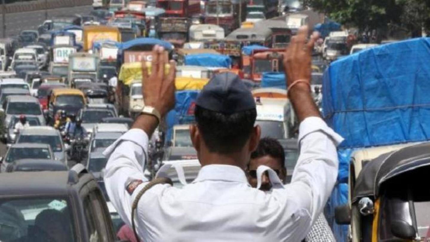 Mumbai-cop stands in rain for 2.5hrs clearing traffic, wins hearts