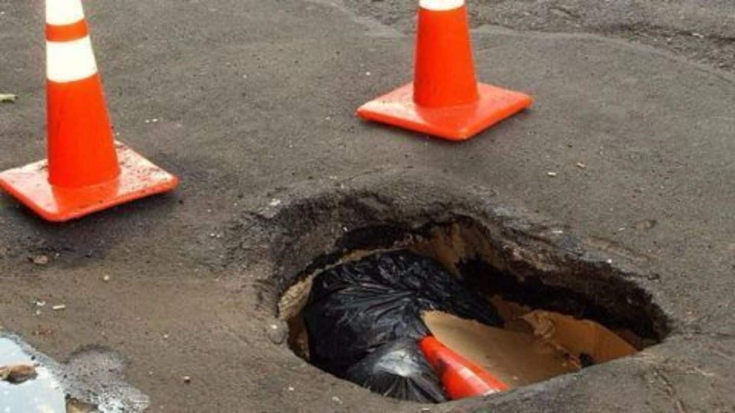 Delhi motorcyclist dies after being trapped in pothole