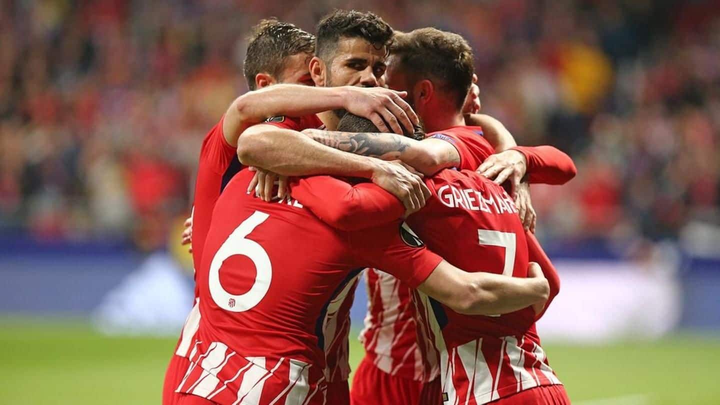 Football: Atletico, Arsenal clinch crucial home wins