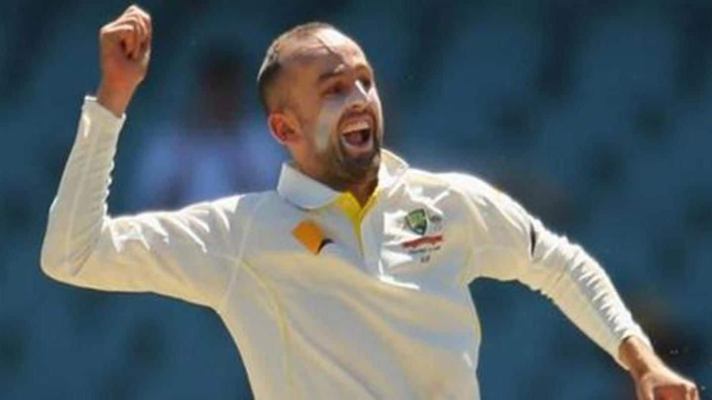 Nathan Lyon goes past these two Aussie legends