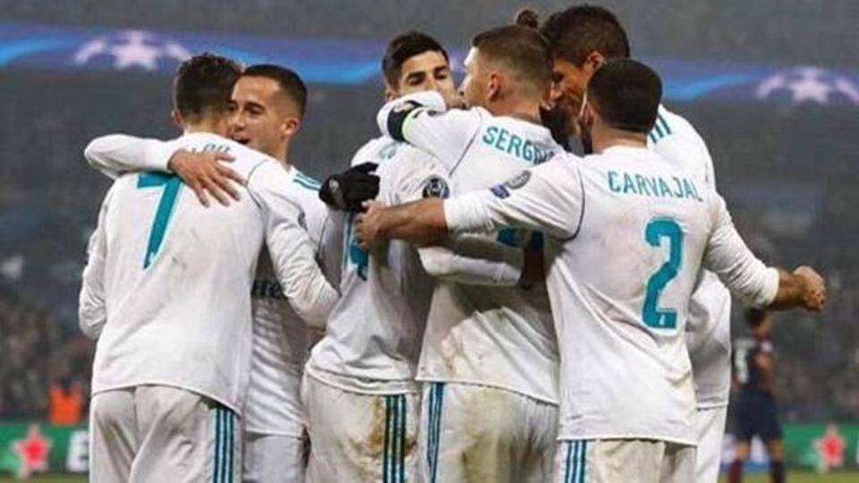 Real Madrid beat PSG 2-1 to reach quarters