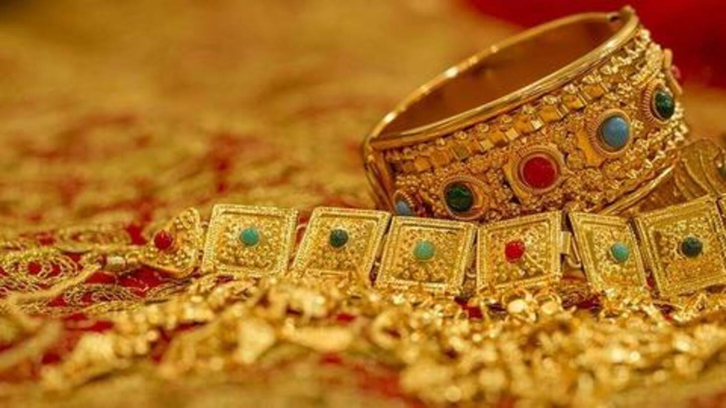 Gold falls by Rs. 235 on muted demand; silver steady