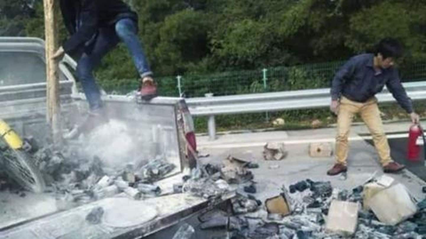 Chinese driver throws cigarette butt out, sets truck on fire