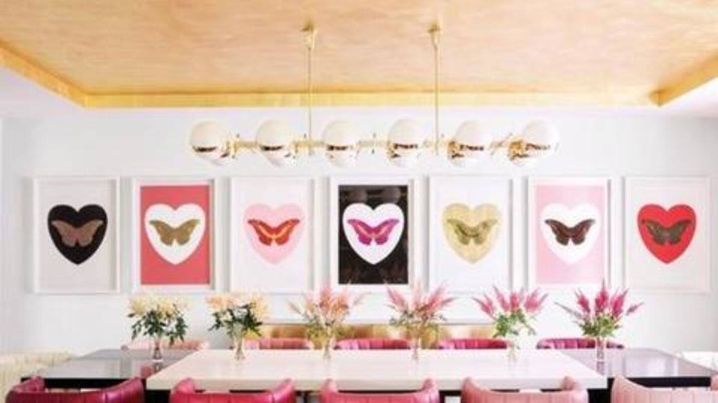 Dining room has silk screens of butterflies, gold-leaf ceiling