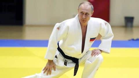 Putin takes down Olympic judo champions, then gets beaten