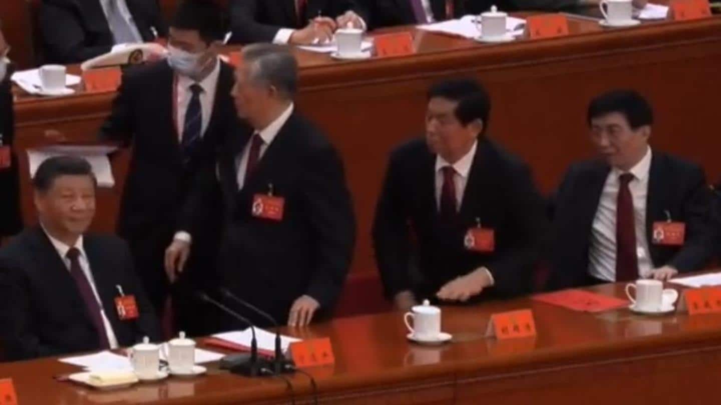 Reluctant to leave, China's ex-president Hu Jintao forcefully escorted out