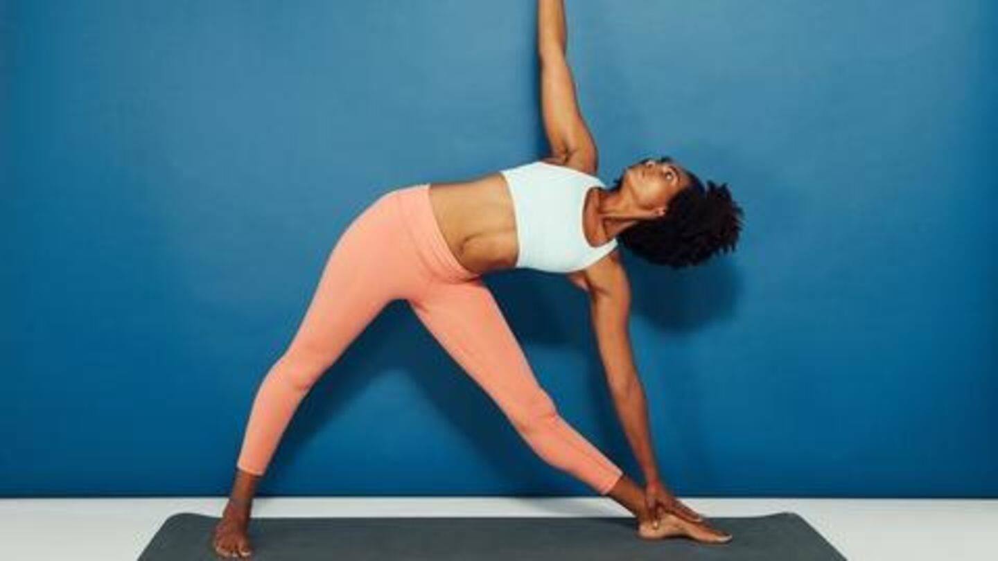 Triangle pose: It will help stretch and strengthen your back Triangle pose: It will help stretch and strengthen your back