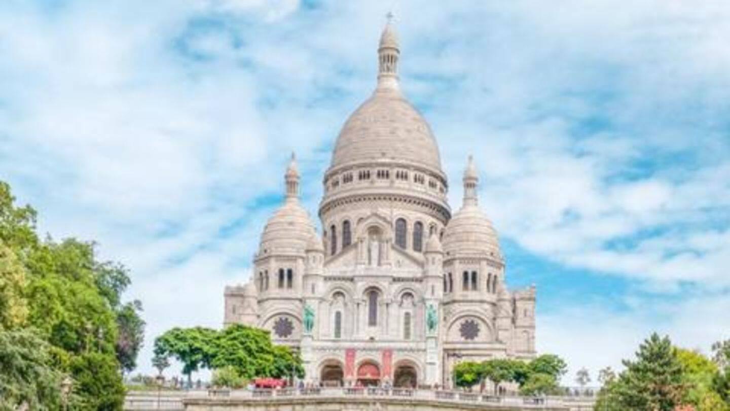 Dome of Sacré Coeur Basilica and the Flame of Liberty Dome of Sacré Coeur Basilica and the Flame of Liberty