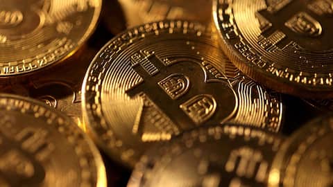 Bitcoin hits 10-month low as economic worries weigh on markets
