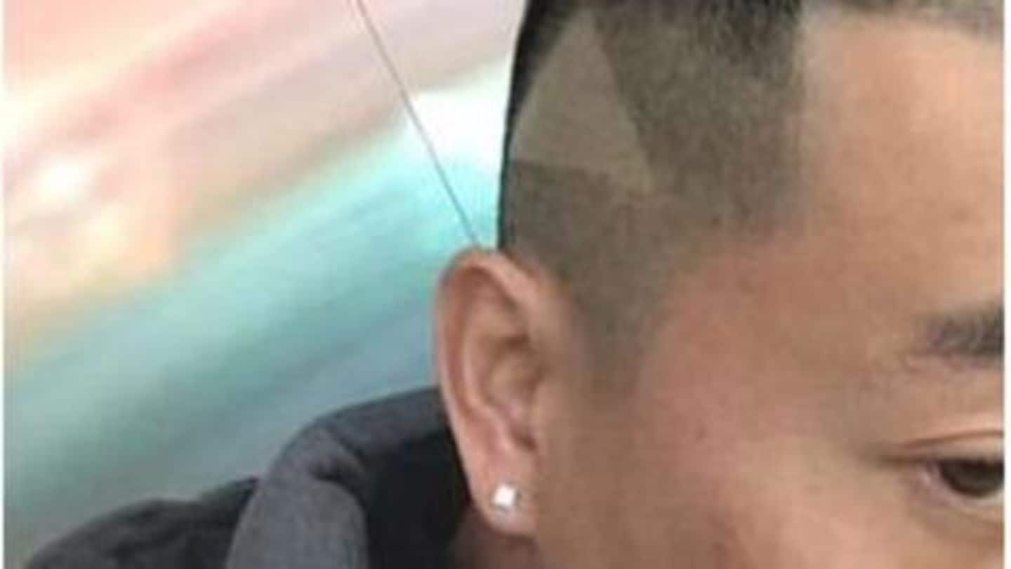 Man gets 'Play Button' haircut, as barber replicated paused video