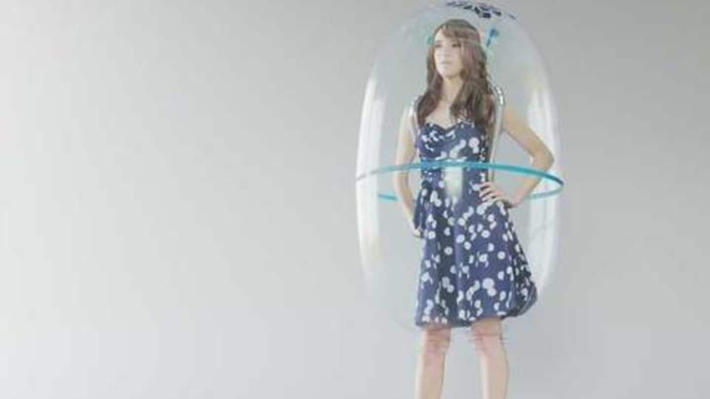 Protective suit for creating 'personal environment' in public spaces Protective suit for creating 'personal environment' in public spaces