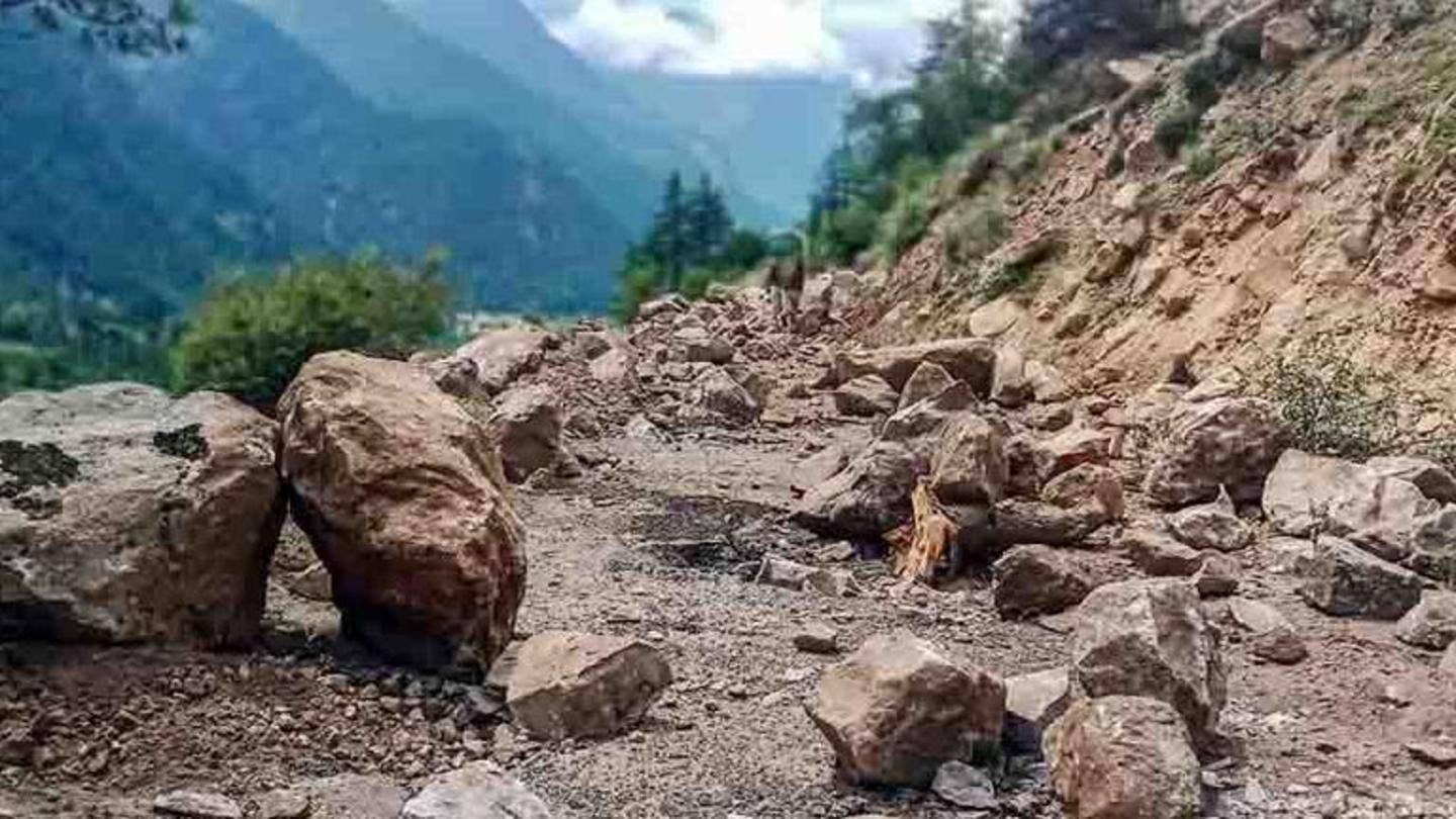 Video shows boulders rolling downhill, causing the bridge to collapse Video shows boulders rolling downhill, causing the bridge to collapse