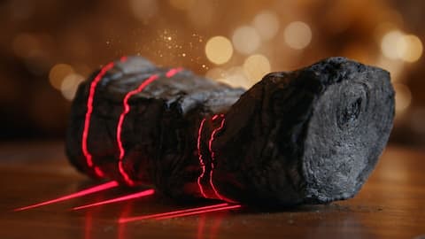 Ancient scroll charred during Vesuvius eruption deciphered using AI