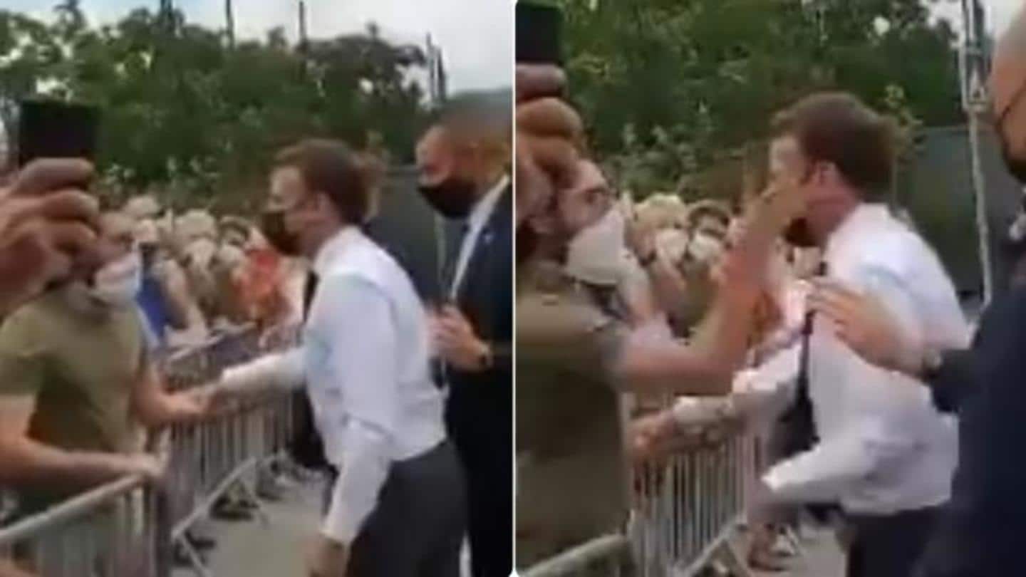 Man in crowd slapped Macron; security quickly intervened Man in crowd slapped Macron; security quickly intervened