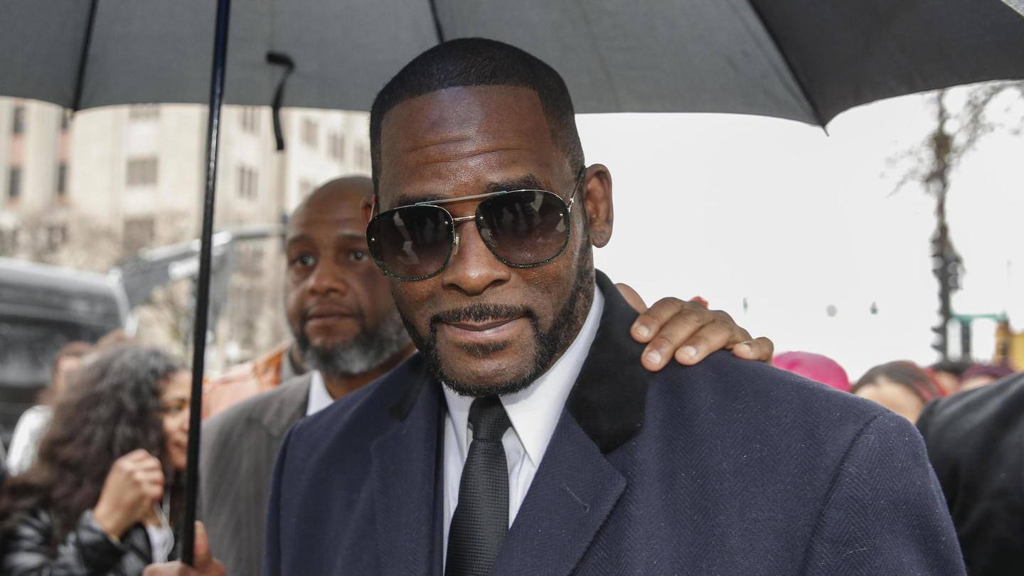 Disgraced singer R Kelly's "friends" arrested for threatening victims
