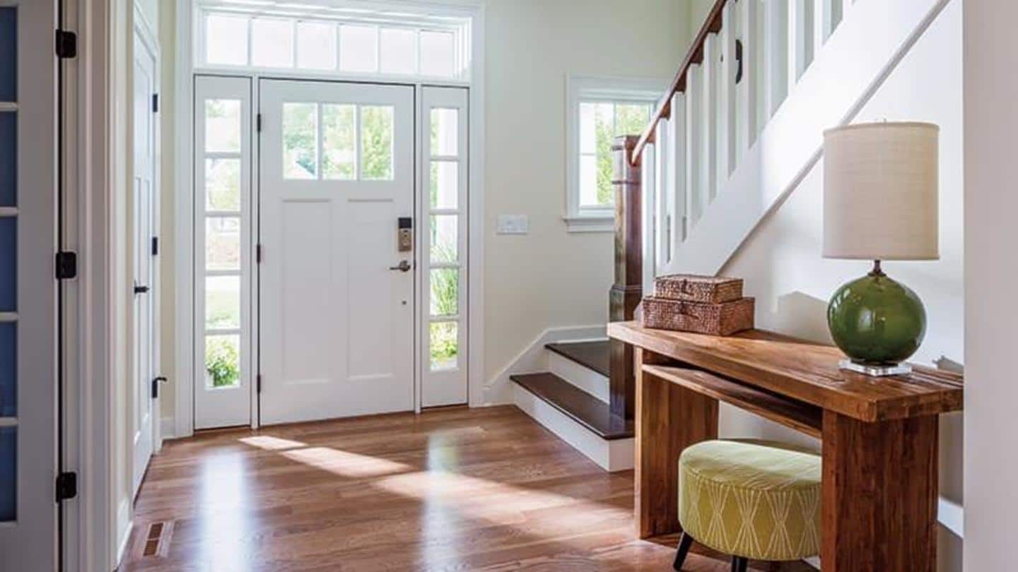 Use pieces of art and chic furniture in your entryway Use pieces of art and chic furniture in your entryway