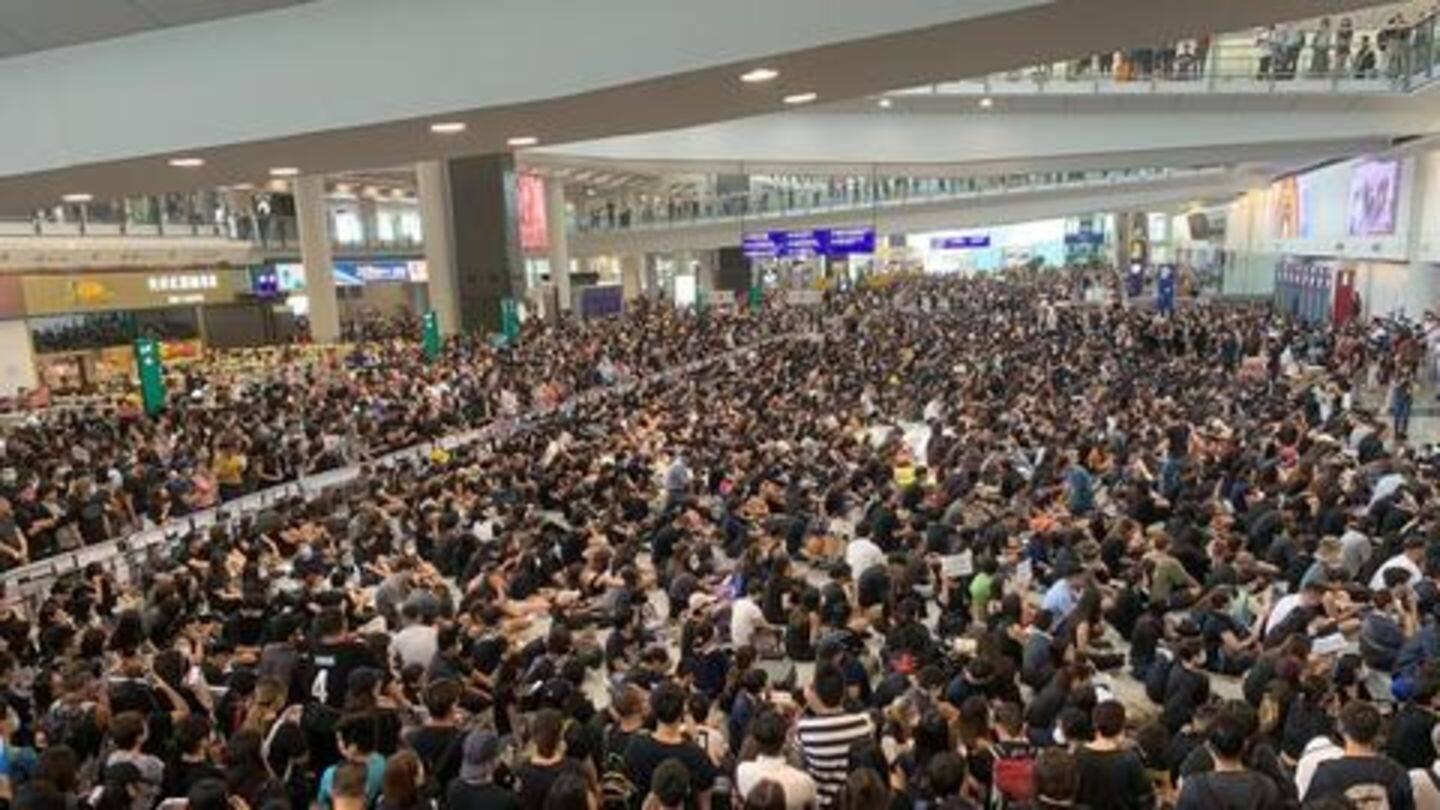 Hong Kong International Airport cancels all flights after thousands protest