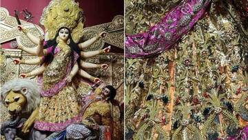 Goddess Durga clad in 22kg gold saree at London-themed pandal