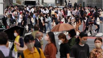Japan extends virus emergency until end of September