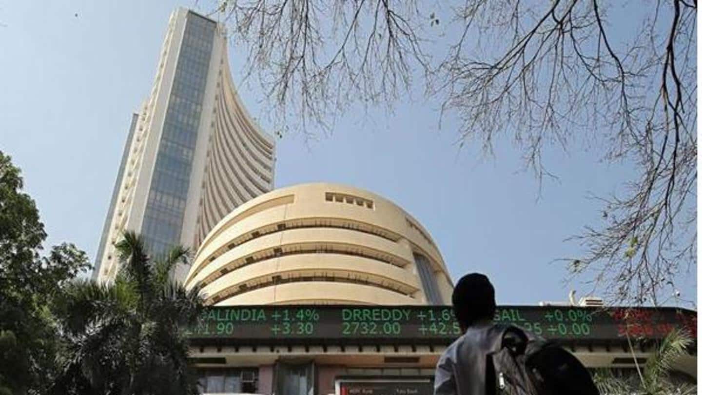 Sensex surges over 200 points to hit fresh record