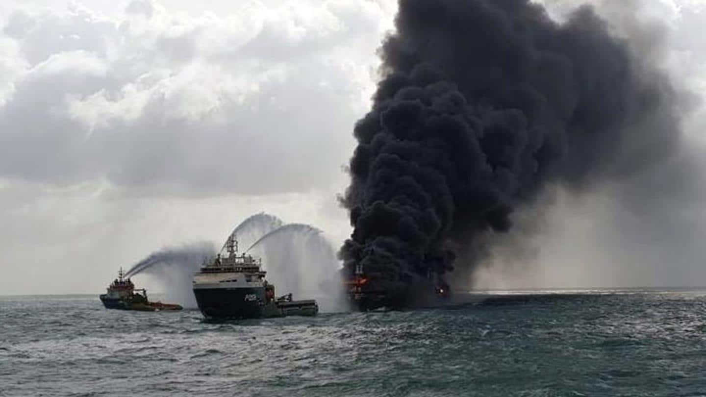 Authorities warn against 'acid rains' due to burning cargo ship