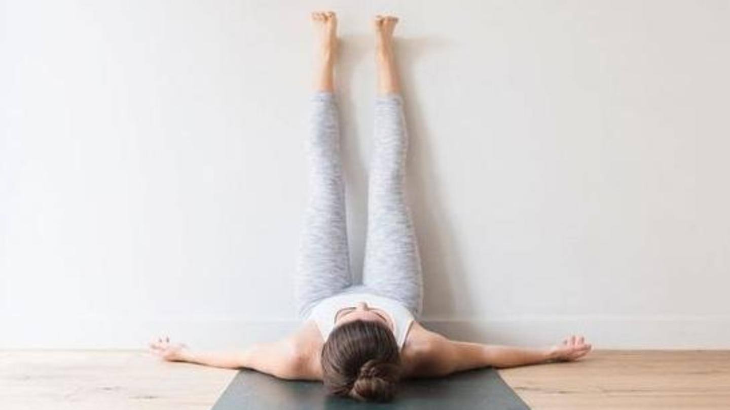 Viparita Karani or legs up the wall pose Viparita Karani or legs up the wall pose
