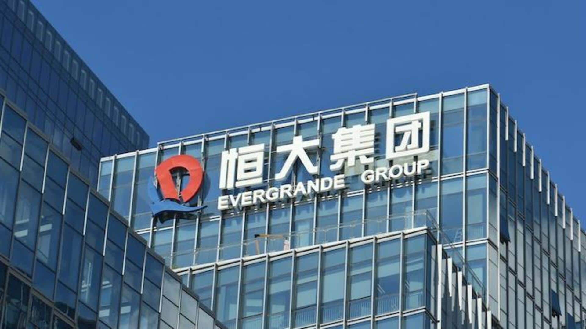 China Evergrande's shares plunge 25% amid staff detentions