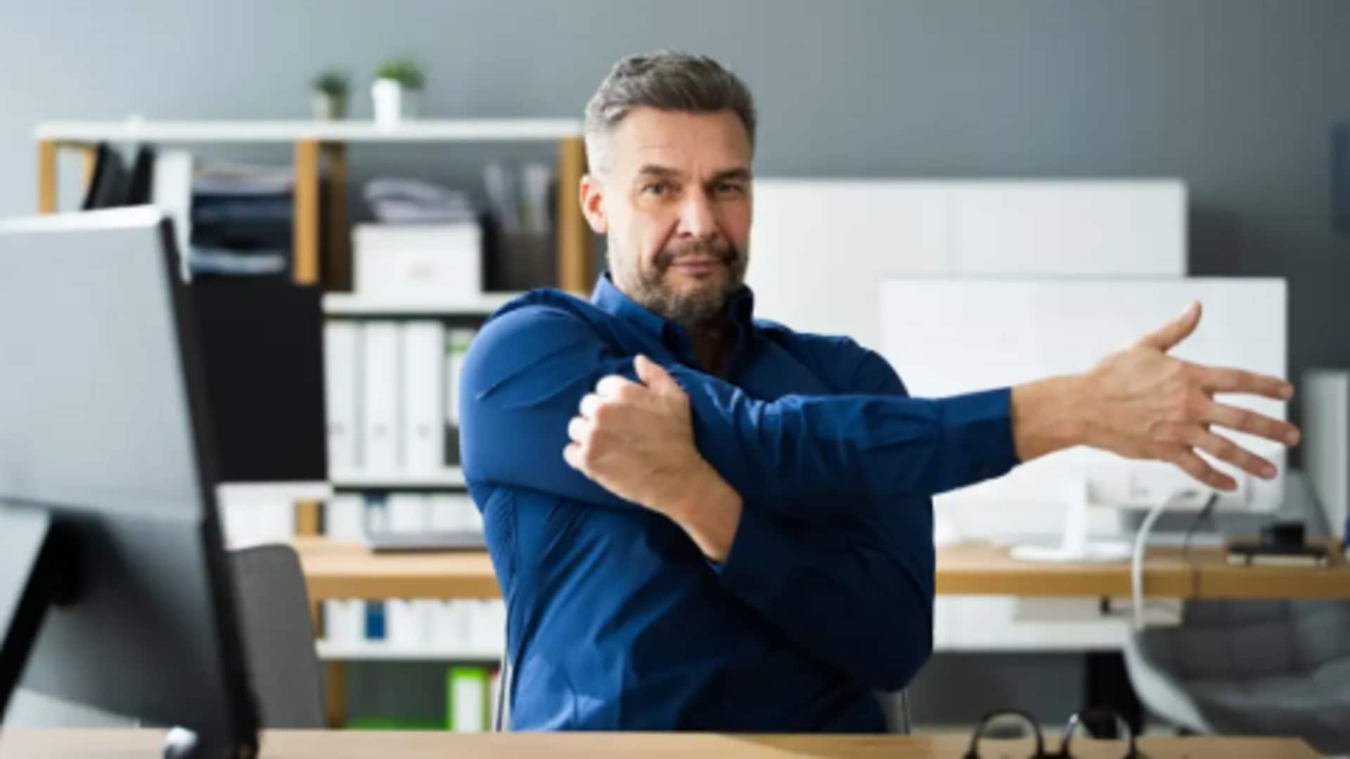 Try these simple desk exercise to stay active at work Try these simple desk exercise to stay active at work