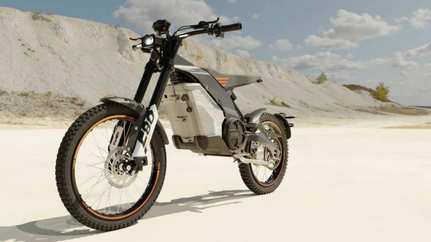 The bike has a single-piece seat and spoked wheels The bike has a single-piece seat and spoked wheels