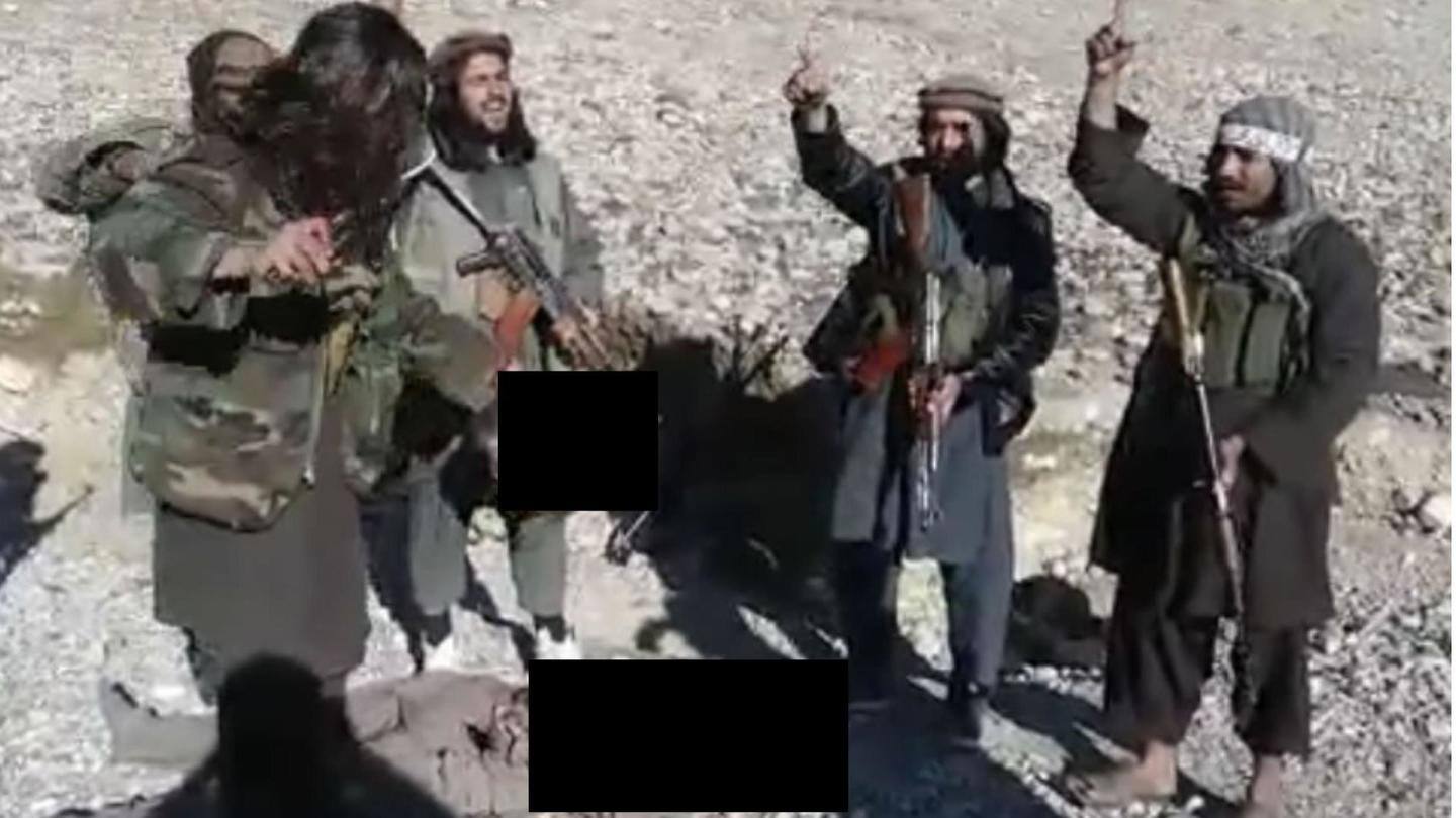 Undated video shows Taliban celebrating after beheading Afghan soldier