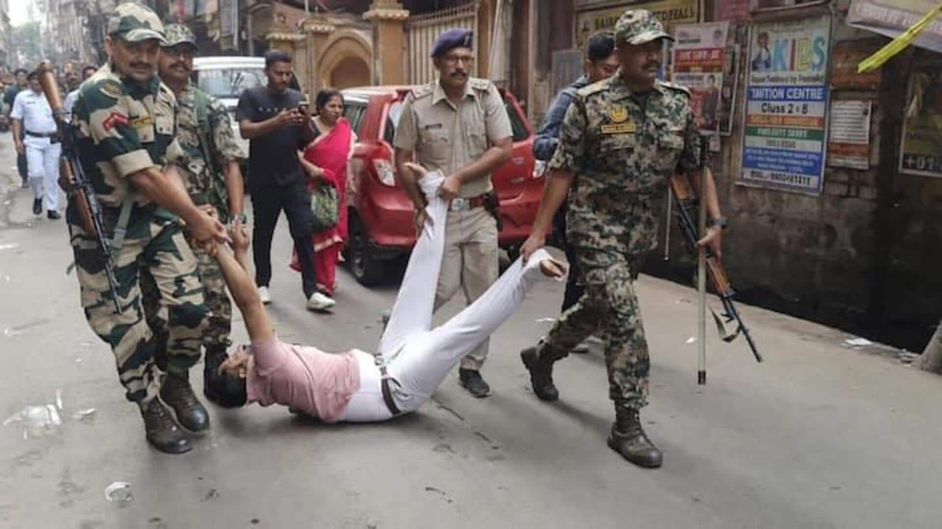 Chaos in Howrah over 'EVM glitch'; CRPF drag away voters  