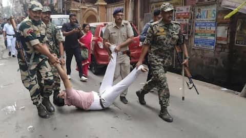 Chaos in Howrah over 'EVM glitch'; CRPF drag away voters  