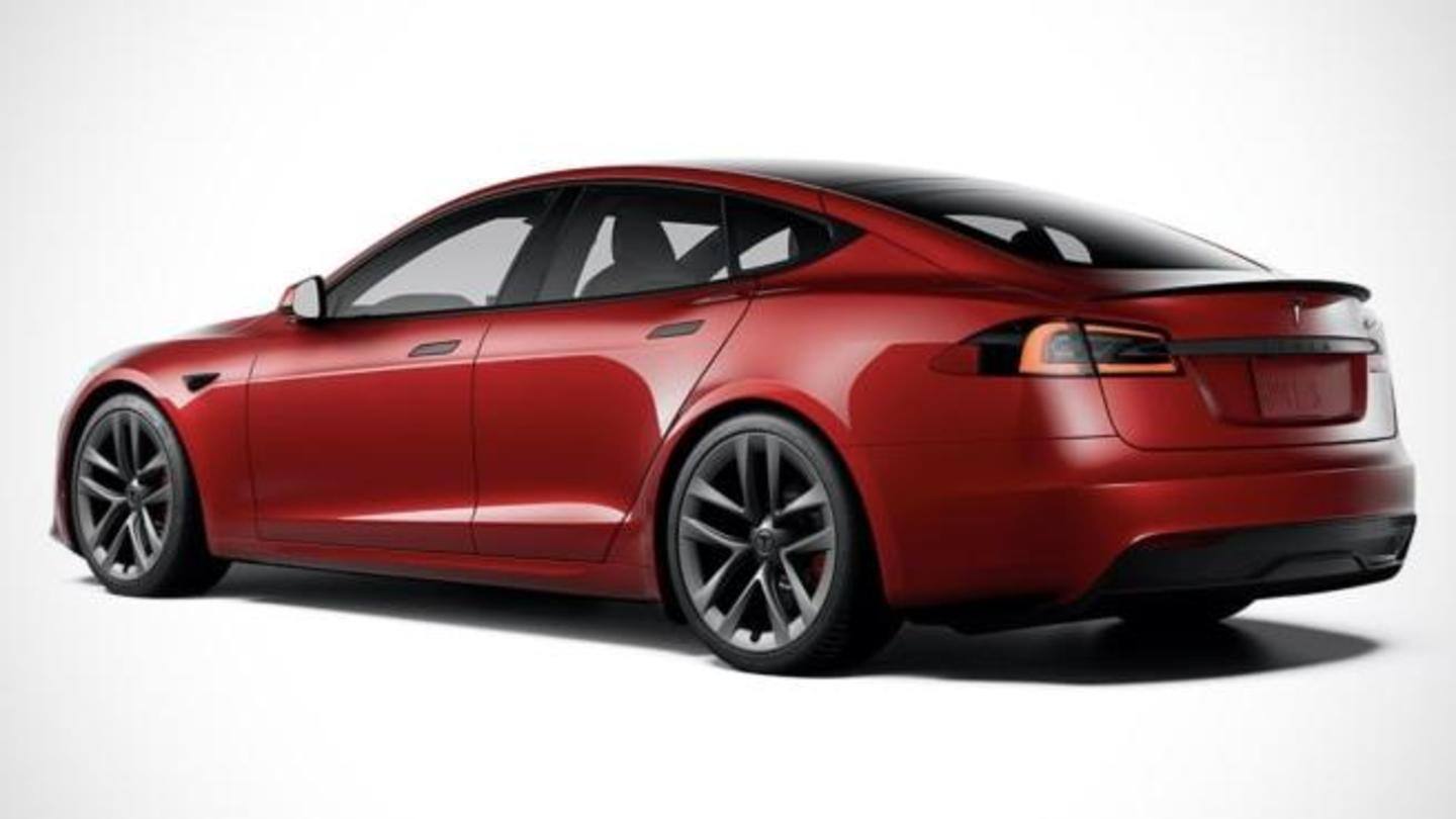 The car had a lengthy hood and sleek headlights The car had a lengthy hood and sleek headlights