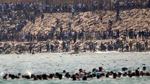 Spain deploys military after thousands of Moroccan migrants enter Ceuta 