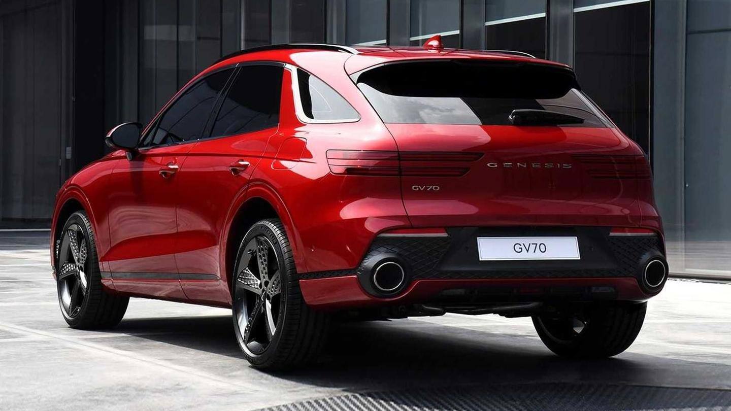 The car sports a large mesh grille The car sports a large mesh grille