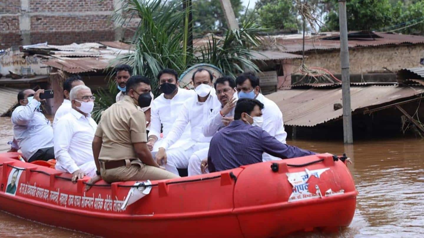 Pawar tours flood-hit villages, uses rescue boat to reach out