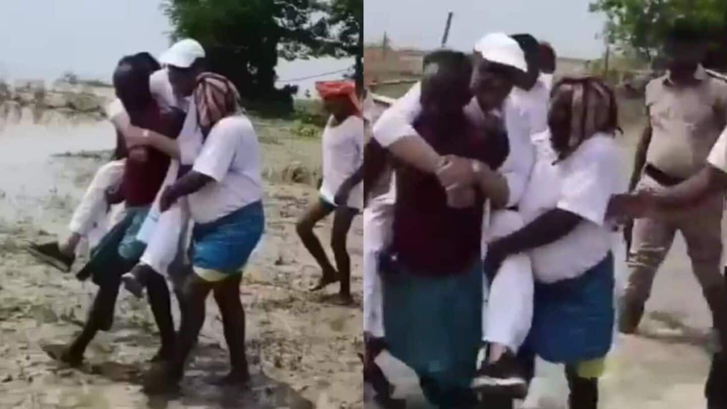 Video: Congress MP carried on villager's back during flood inspection Video: Congress MP carried on villager's back during flood inspection