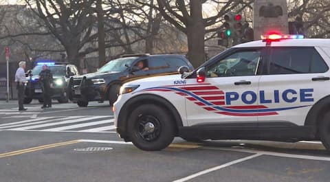 Van crashes into White House barricade; driver detained