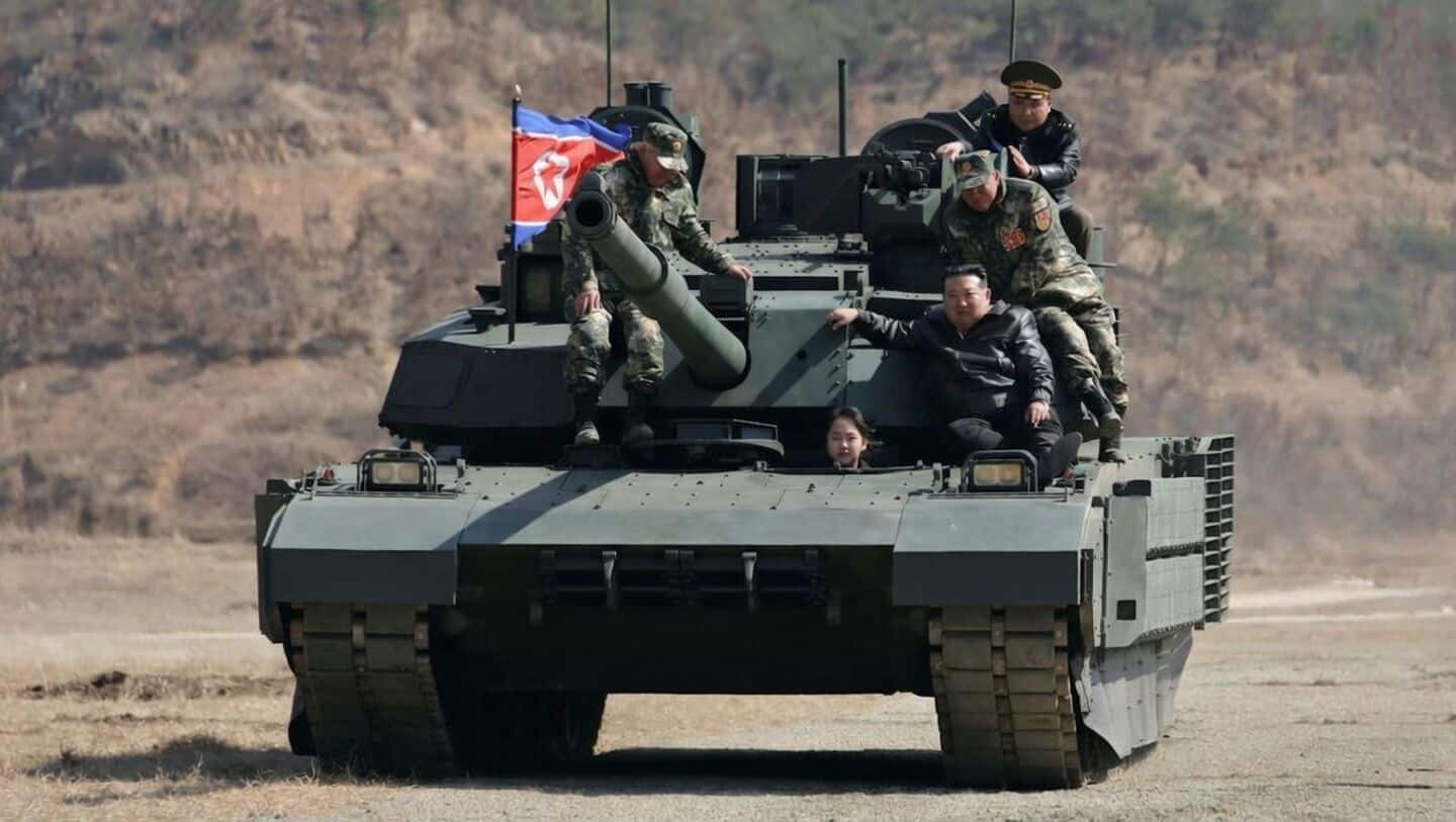 Kim Jong-Un oversees drill showcasing new tank with his daughter