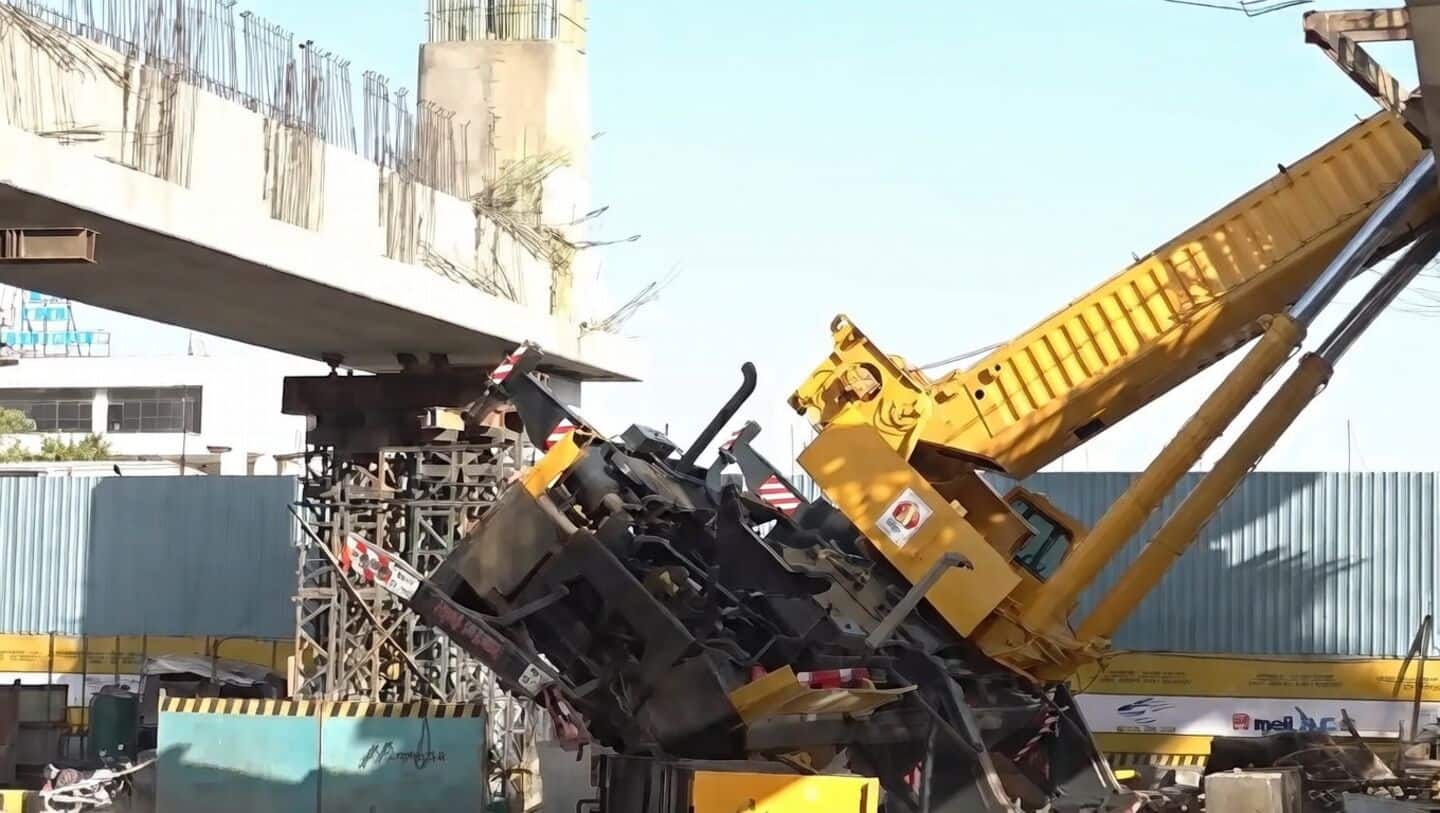 Entire beam, crane hoisting it, falls at BKC metro site 