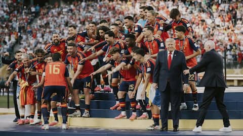 Trump refuses to leave stage during World Cup trophy lift