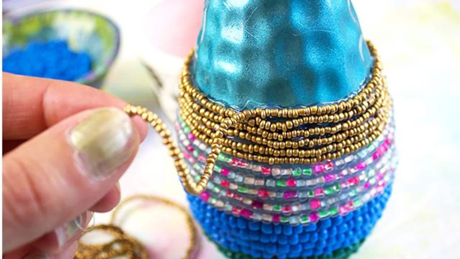 Transform old glass bottles into beaded art pieces 