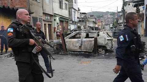 Huge police raid on Rio gang leaves 64 people dead
