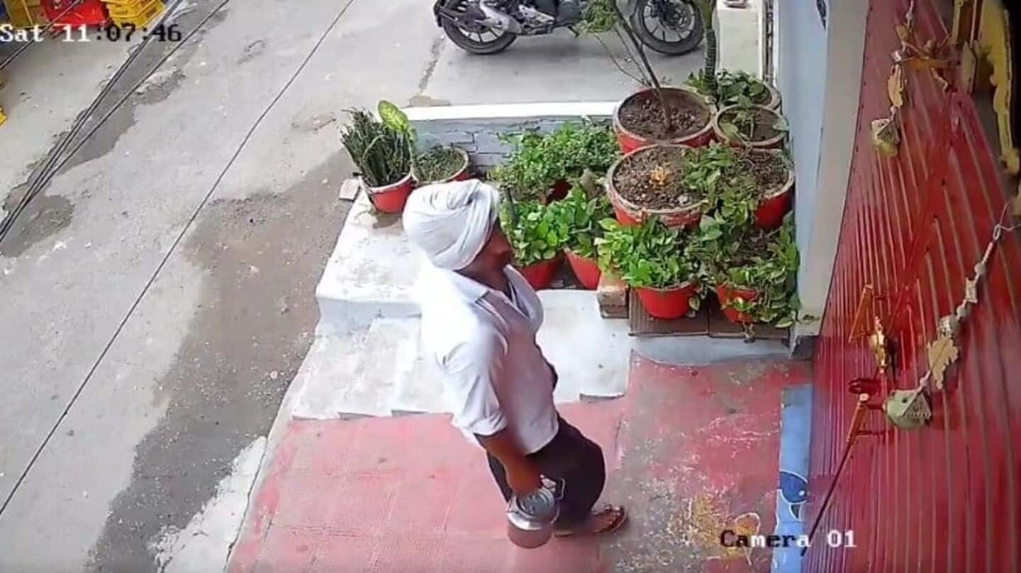 On camera: Lucknow milkman caught spitting in customer's milk; detained On camera: Lucknow milkman caught spitting in customer's milk; detained